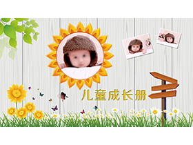 青草花朵背景的可爱儿童成长相册PPT模板