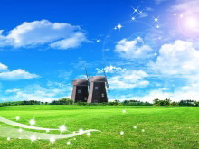阳光明媚的草地风车PPT背景图片