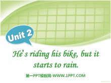 He's riding his bikebut it's starting to rainPPTn3
